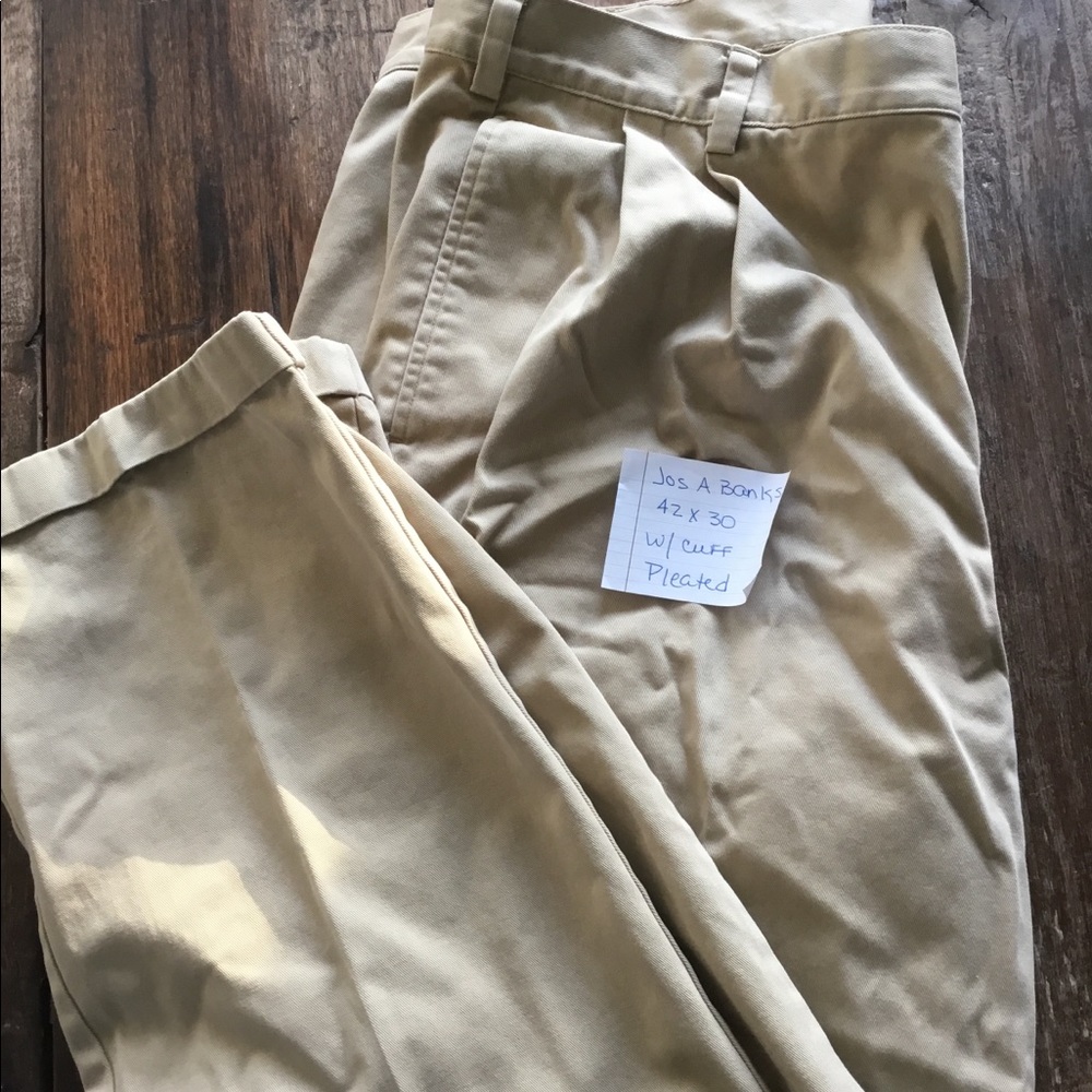 Khaki pants pleated and cuffed